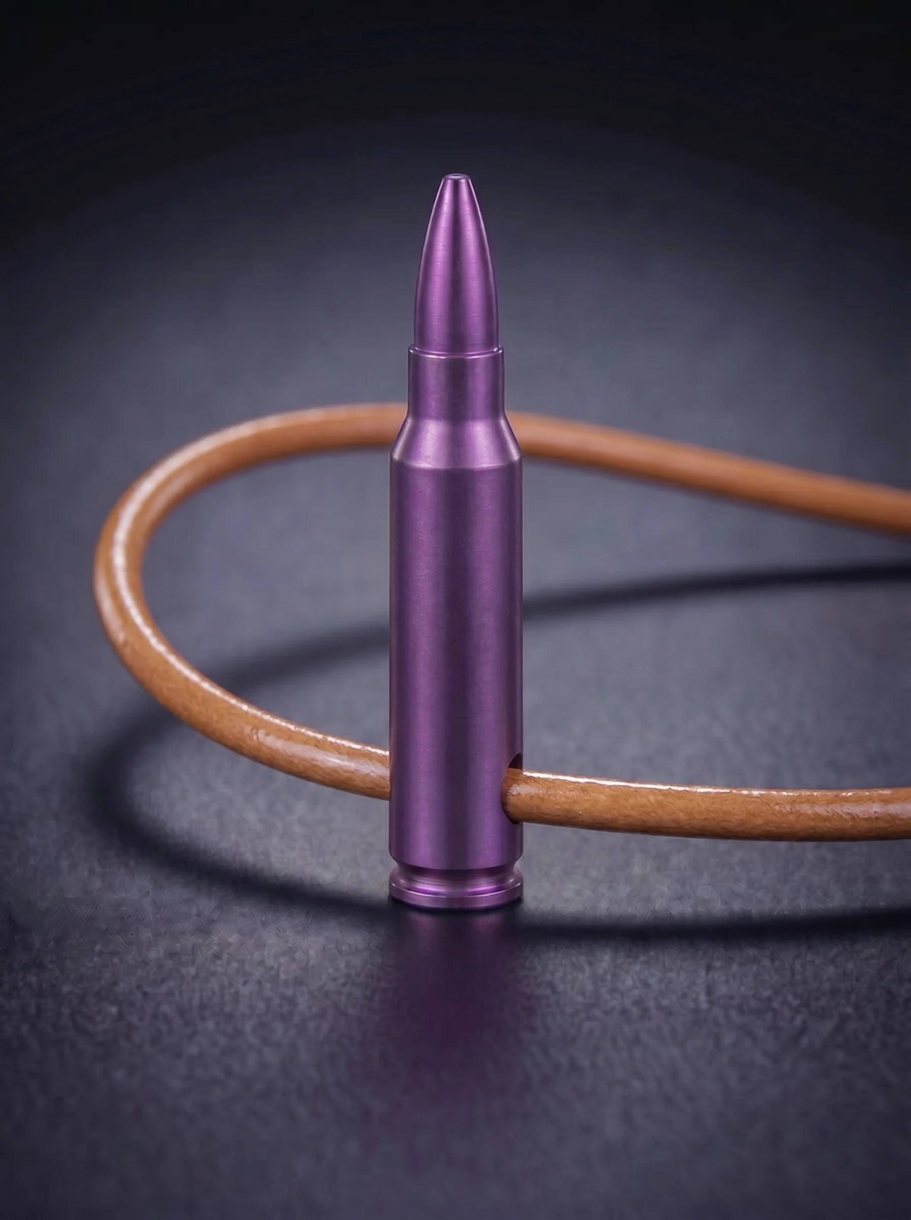 Rifle Cartridge in magenta on original leather cord, view 1