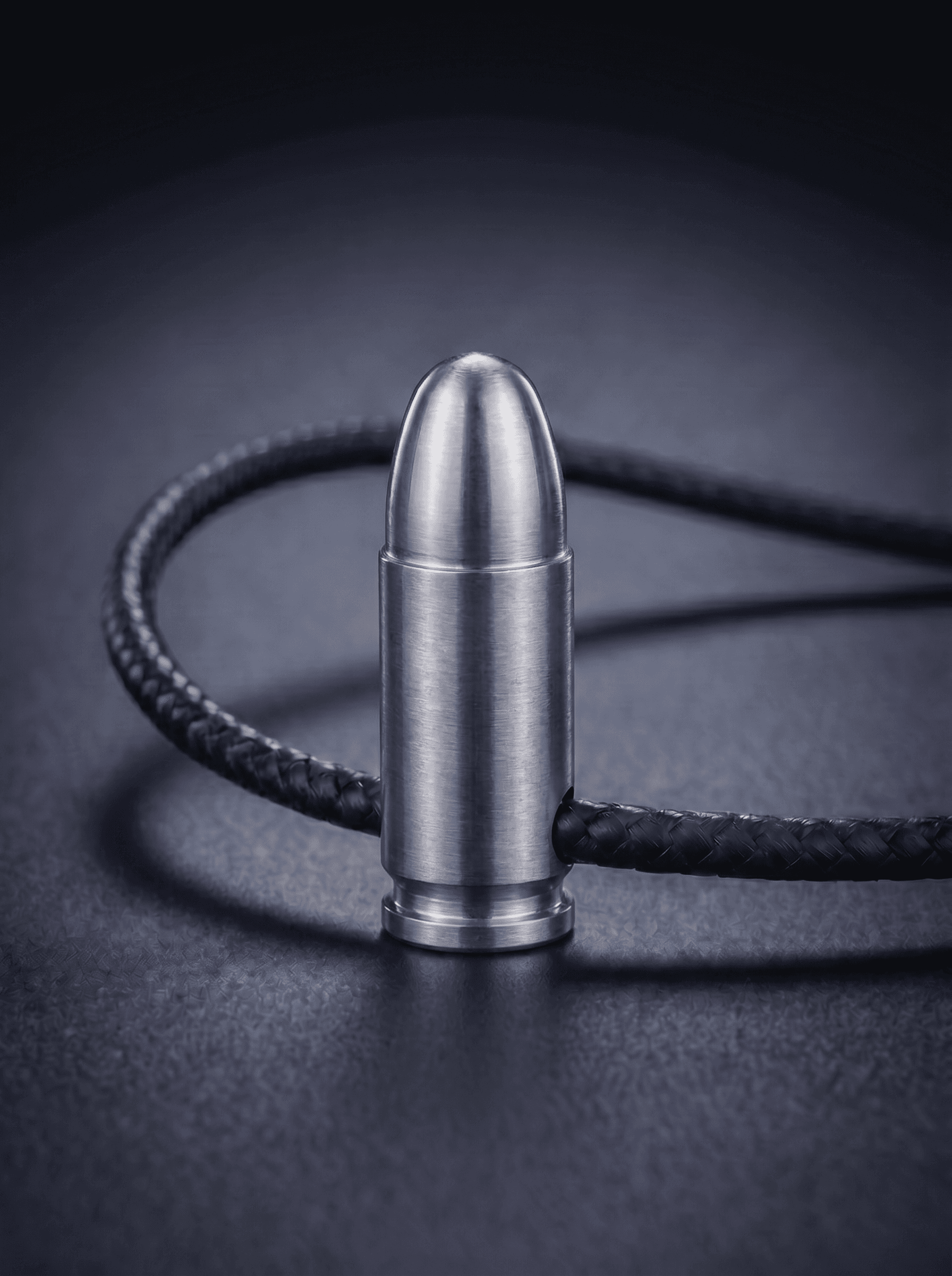Pistol Cartridge in natural titanium — Wear Metal