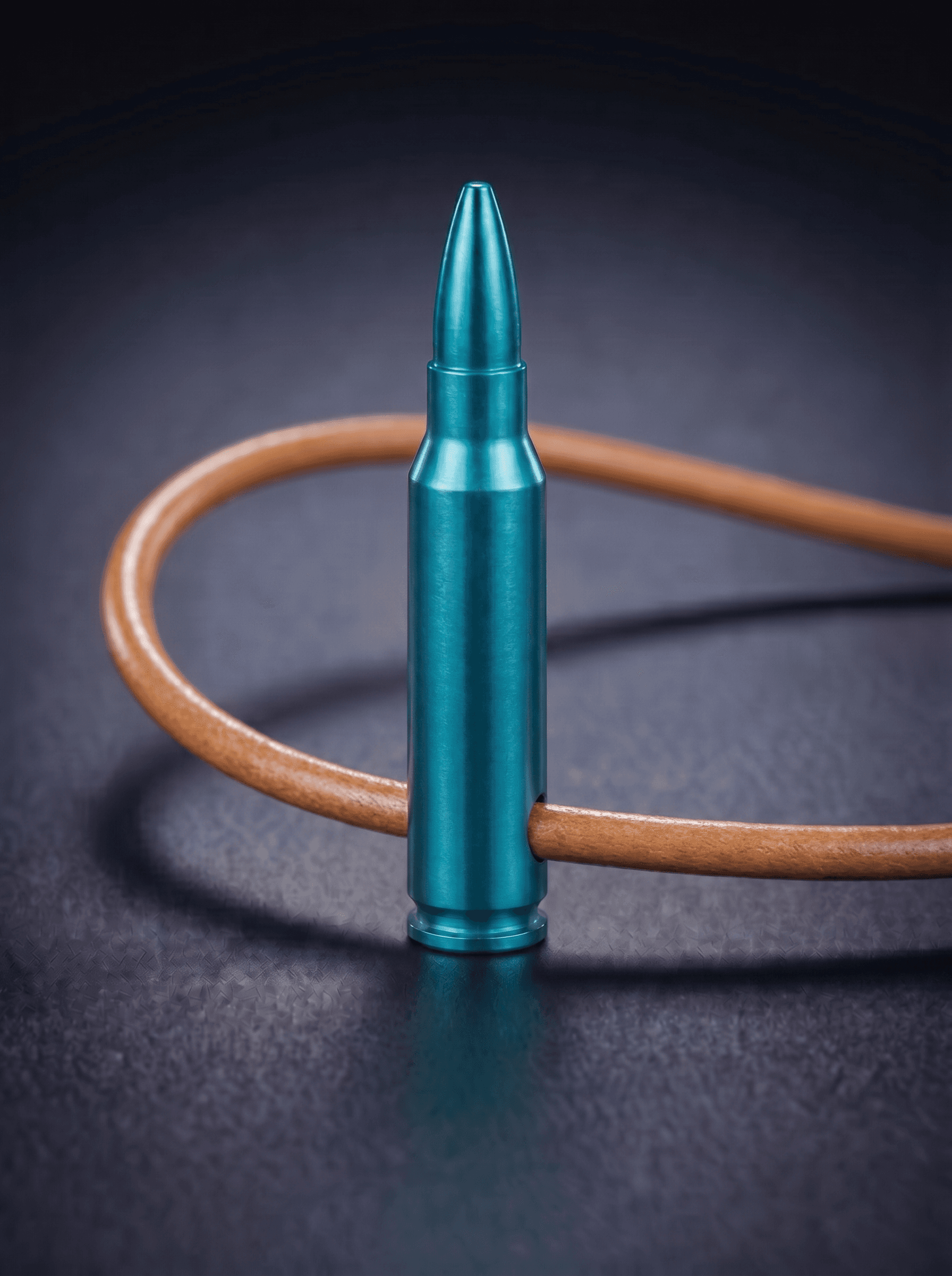 Rifle Cartridge in green on original leather cord — view 1 — Wear Metal