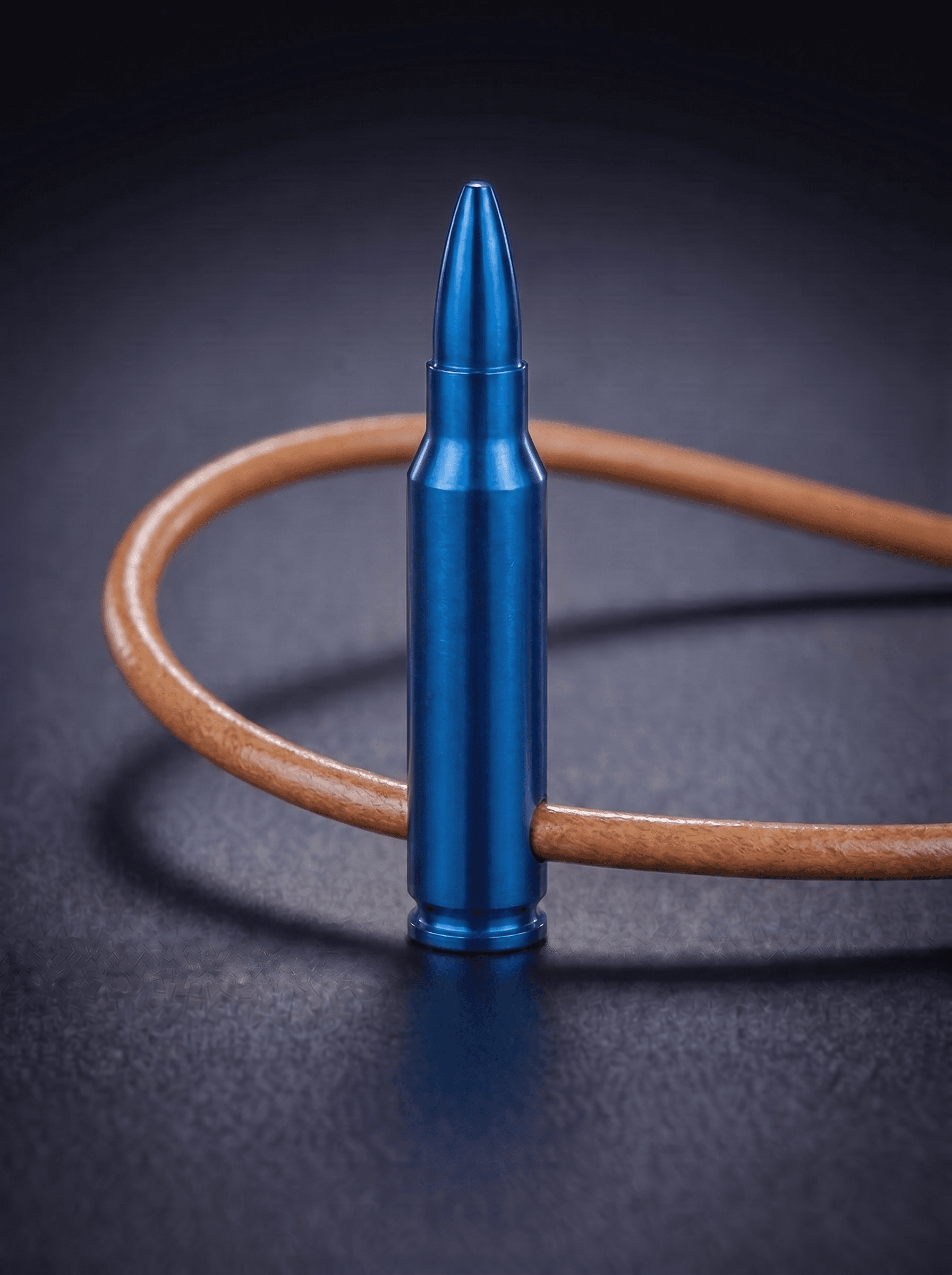 Rifle Cartridge in blue on original leather cord — view 1 — Wear Metal