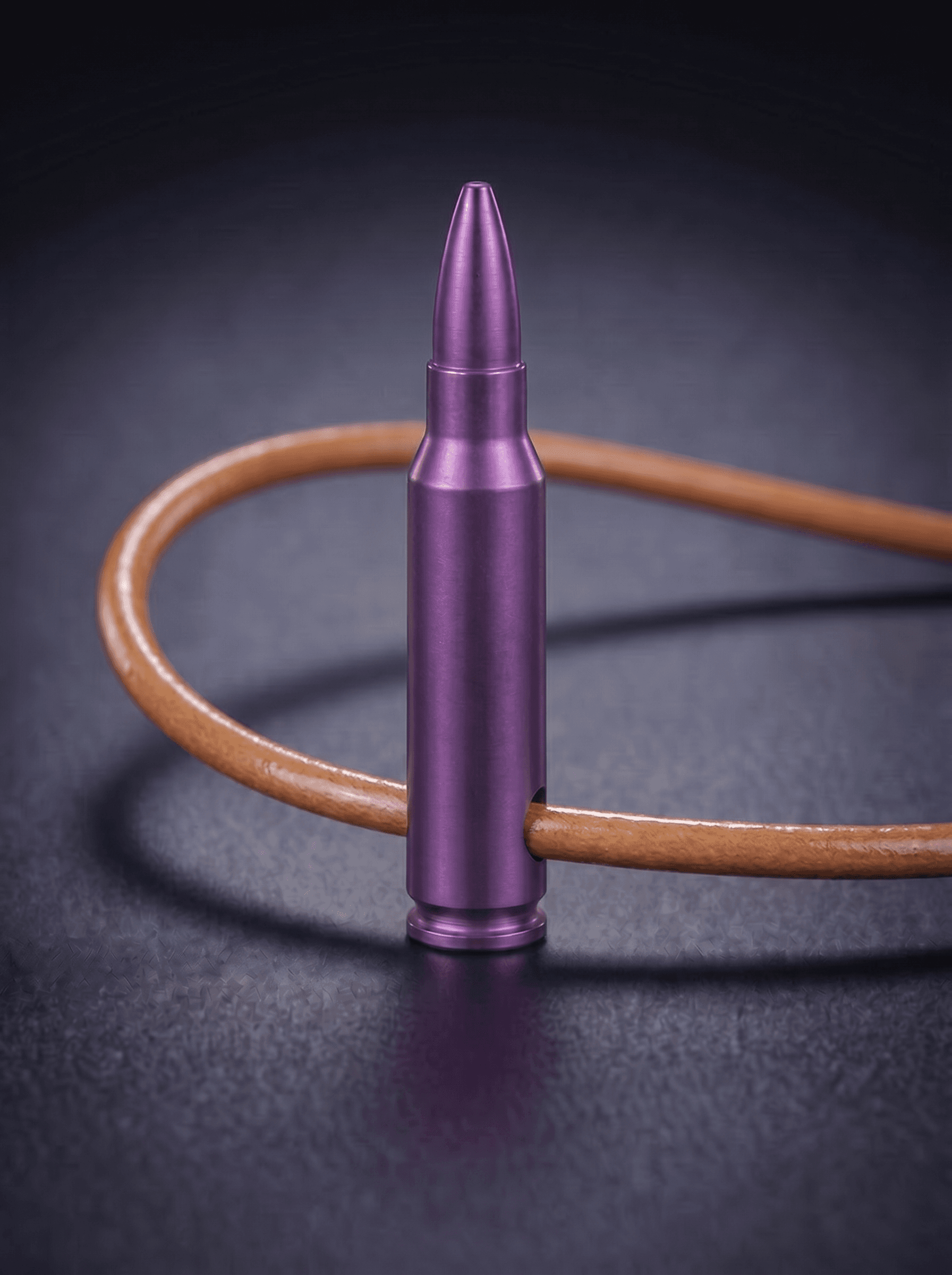 Rifle Cartridge in magenta on original leather cord — view 1 — Wear Metal